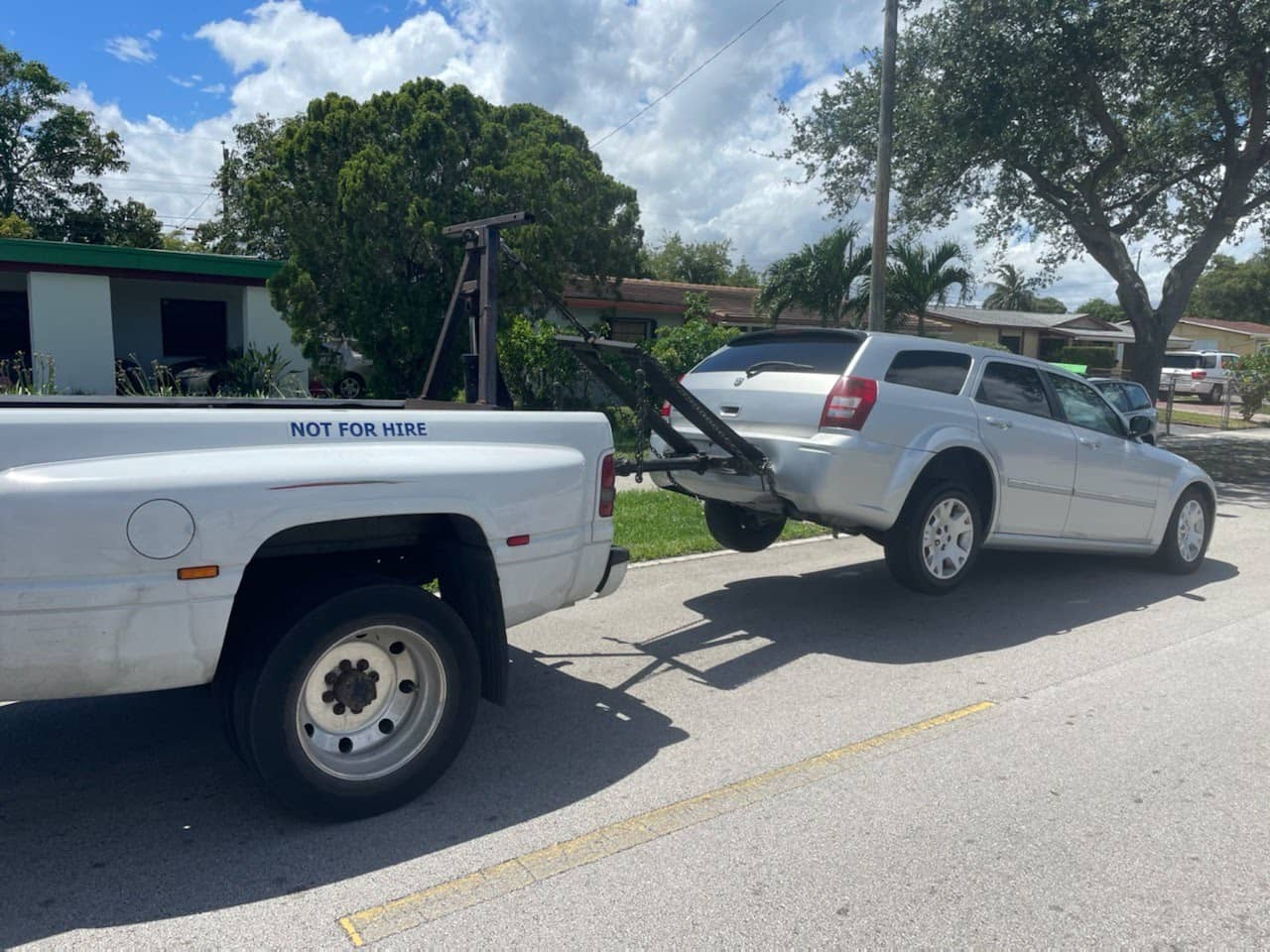 Happy customer receiving cash payment for junk car